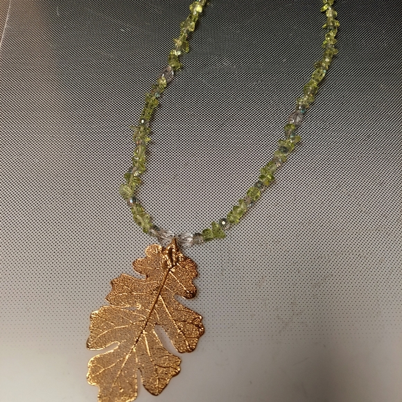 Gold Skelton leaf Olivine crystal necklace 22in 3in pendant - Picture 1 of 5